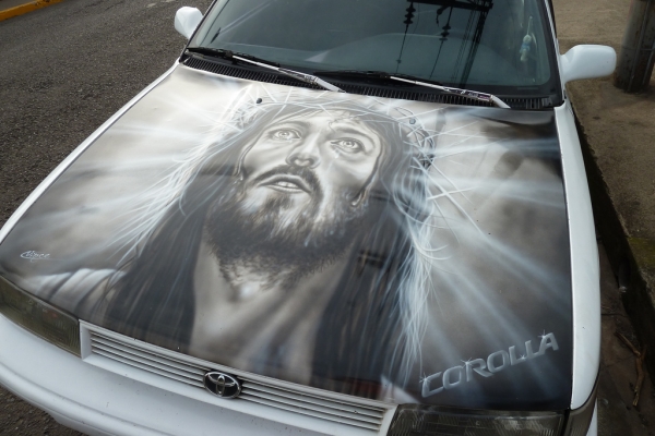 ... Jesus bonnet on toyota corolla - Airbrush Artwoks