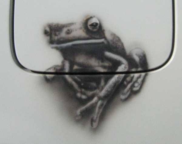 'Lazy Frog' 
My first automotive airbrush on a tank flap, using a little Chameleon Bronze. 2013 - myStuff
