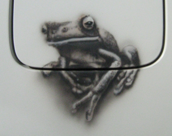 'Lazy Frog' 
My first automotive airbrush on a tank flap, using a little Chameleon Bronze. 2013