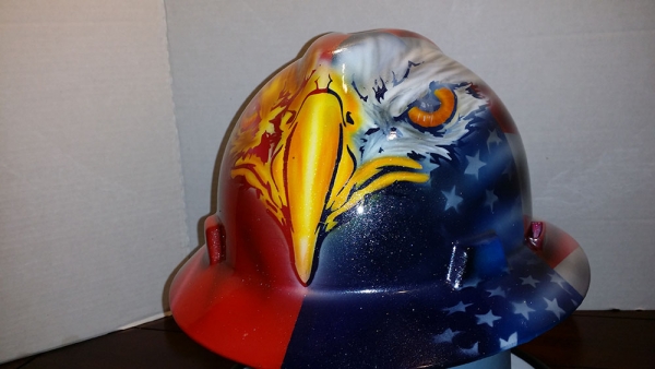 Custom painted hard hat, customer wanted an American/Mexican flag theme with Bald/Gold eagle front.