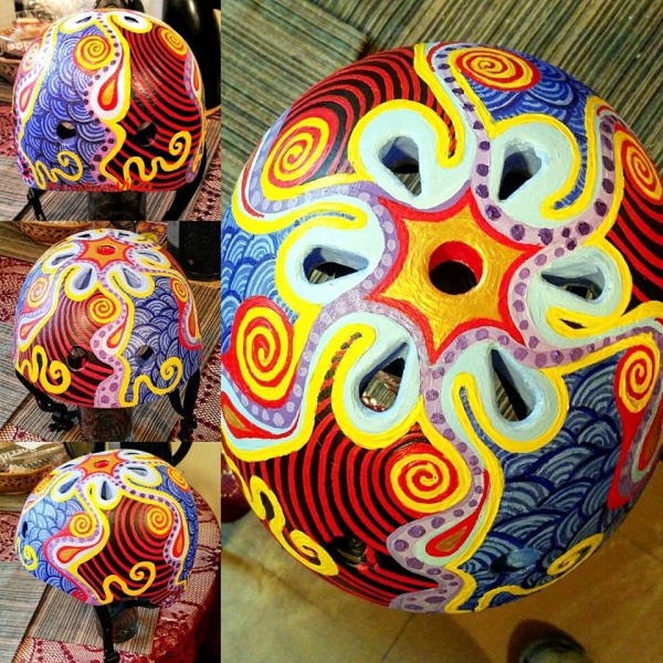 This child's helmet is called " Color Spin " it took me 2 weeks to hand paint this, it was done in acrylics and clear-coat