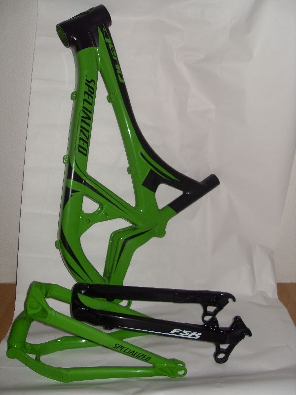 Painting with signature on a bicycle frames