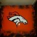 Airbrushed Denver Broncos coffee table for man cave.  By ZimmerDesignZ.com